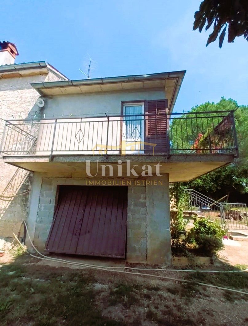 Casa bifamiliare in pietra abitabile, da ristrutturare